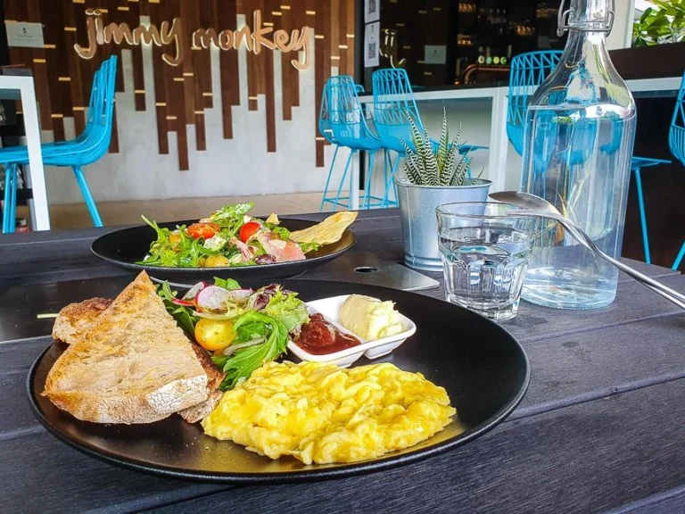 Scrambled eggs toast and salad plate for Office Breakfast Catering in Singapore setup.